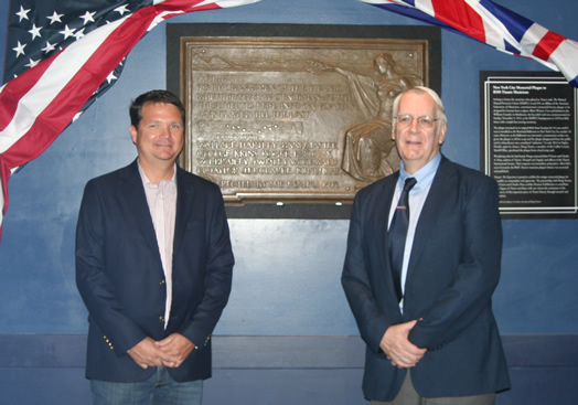 The Titanic musicians' plaque looks great after some cleanup. Pictured are Douglass Turner (left) and Charles Haas, the president of the Titanic International Society. Turner recovered the plaque from a junkyard after it was inadvertently abandoned by Local 802 in NYC and ended up in Florida. The plaque currently resides at the "Titanic: The Experience" exhibition in Orlando.