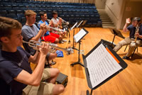 David Krauss, principal trumpet with the Metropolitan Opera Orchestra, instructs the National Youth Orchestra trumpet section on articulation. Photo by Chris Lee.