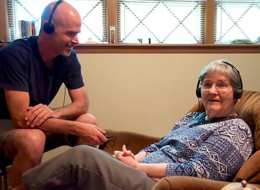 The author and his mother, an Alzheimer's patient, experiencing the joy of music.