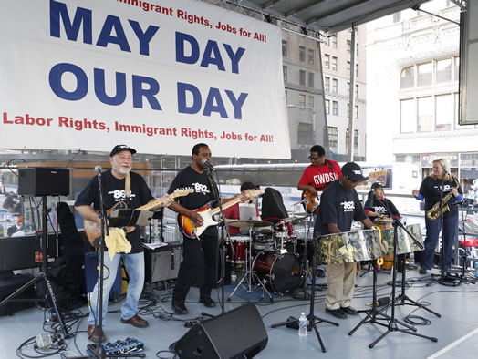 MUSICIANS UNITE: The Central Labor Council’s annual May Day rally at City Hall was set to music by Local 802 musicians. Later, the Justice for Jazz Artists marching band led supporters in a spirited march down Broadway. Photos by Kate Glicksberg.