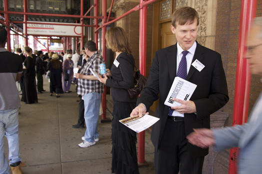 MUSICIANS GET THE WORD OUT: Anne Marie Scharer and Ray Riccomini (pictured at right) were part of a group of Met orchestra musicians who passed out flyers on May 11 in front of Carnegie Hall for the final concert of their season. The musicians were promoting their web site  (www.METOrchestraMusicians.org), their newsletter and their social media accounts, which they hope will offer a richer and more immersive musical experience for opera fans and audience members. Photo by Rob Knopper.