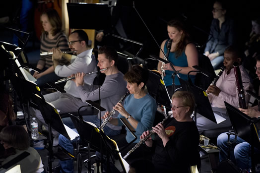 FINE TUNING: The woodwind section of the Met Opera at a recent rehearsal. Elaine Douvas pictured in blue shirt. (Photo: Jonathan Tichler)