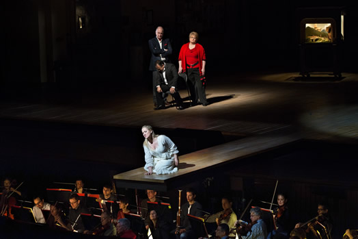 VOICE FROM ABOVE: Singer Diana Damrau in a scene from Bellini's "La Sonnambula" with Met Opera musicians below. (Photo: Marty Sohl)