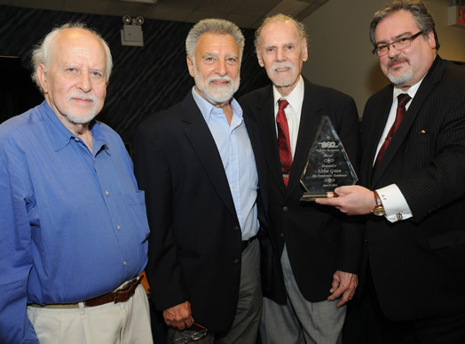 CELEBRATING A LEGEND: Local 802 honored trombone master Urbie Green at a special reception at the union in late June. From left, Dick Lieb, Marvin Stamm, Urbie Green and Local 802 President Tino Gagliardi presenting a plaque to Urbie. Photo: Steve Singer