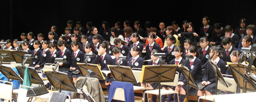 As part of Project Hand in Hand, a children's chorus performed.