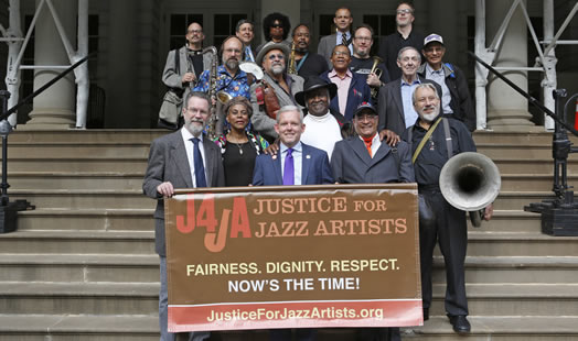 Jazz musicians and union staff are in high spirits after City Council voted to support Justice for Jazz Artists. Photo: Kate Glicksberg.