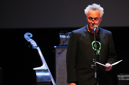 Local 802 member Marc Ribot tells a packed audience about how tech companies like Google exploit the talent of musicians. Photo: Steve Singer