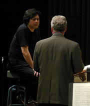 Maestro Atushi Yamada and NYCO personnel manager David Titcomb.