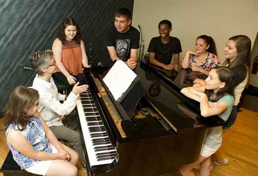 Local 802 member BJ Gandolfo rehearses campers at Summer Stock Jr.