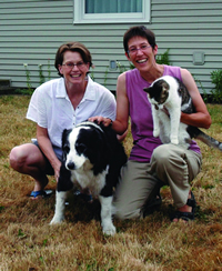 Mary Whitaker (left) and her partner Suzanne Gilman, with dog Bridey and cat Tosca. Photo by Roy Lewis.