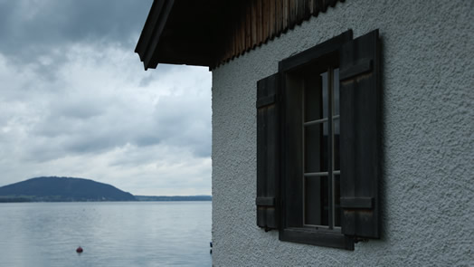 The debut season of the Philharmonia Orchestra of New York featured accompanying films and robotic cameras. Above, a scene from the movie that accompanied a live performance of Mahler's Symphony No. 2. It's an image of the alpine lake where Mahler composed his work.