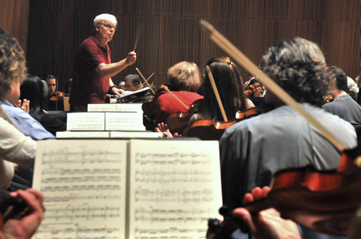 Maestro Ormsby Wilkins conducts.