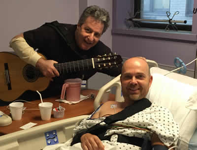 Andrew Schulman uses his music to help hospital patients. Photo: Pilar Baker