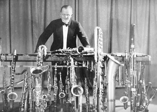 Check out that woodwind collection - now that's doubling! Ross Gorman (above) was one of the wind doublers in Paul Whiteman's orchestra and was the clarinetist who initially performed the famous opening of Gershwin's "Rhapsody in Blue." Photo courtesy of Sheila Gorman.