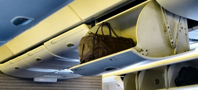 Musicians have been recently covered under a 2012 FAA rule that allows carrying on instruments. But new "basic economy" fares that airlines are introducing with no carry-on privileges may threaten this right. Photo: Lozano via istockphoto.com